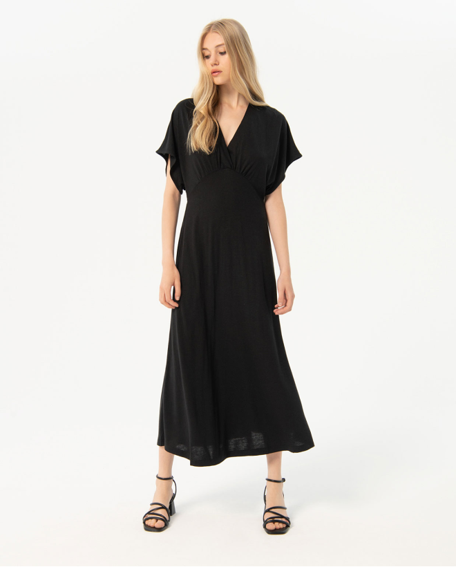 Robe midi unie à manches...