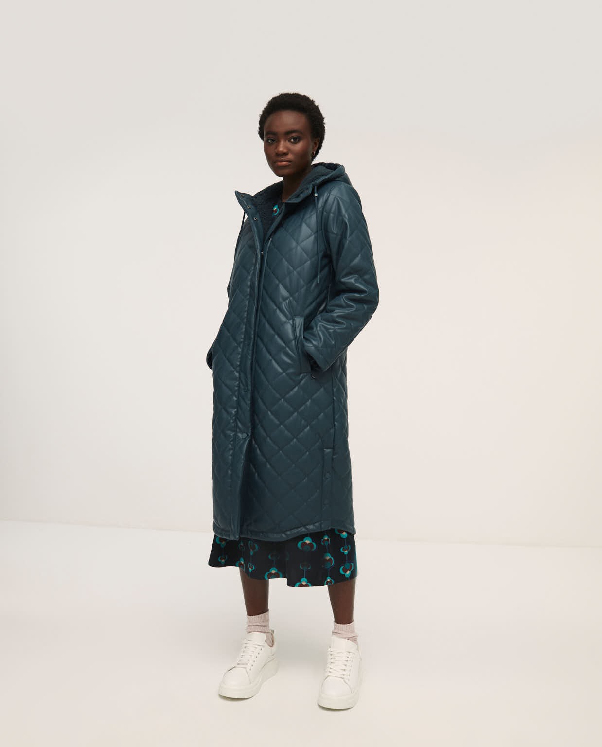 Quilted coat lined in shearling Petrol blue