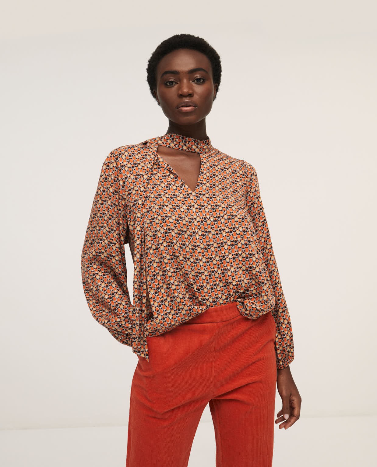 Blouse with v-neck and loop Orange