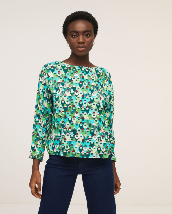 Blouse avec bouton et larme au dos. Vert