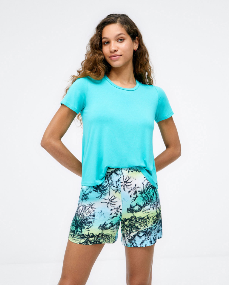 T-shirt large à manches courtes. Elastique. Turquoise