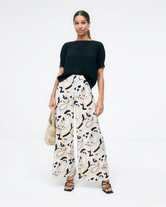 Blouse à manches françaises...