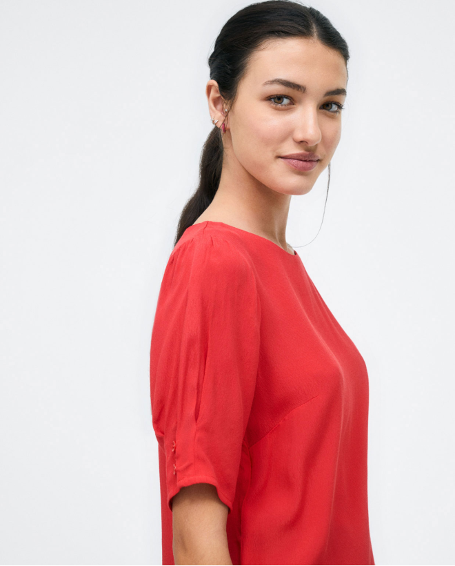 Blouse à manches françaises...