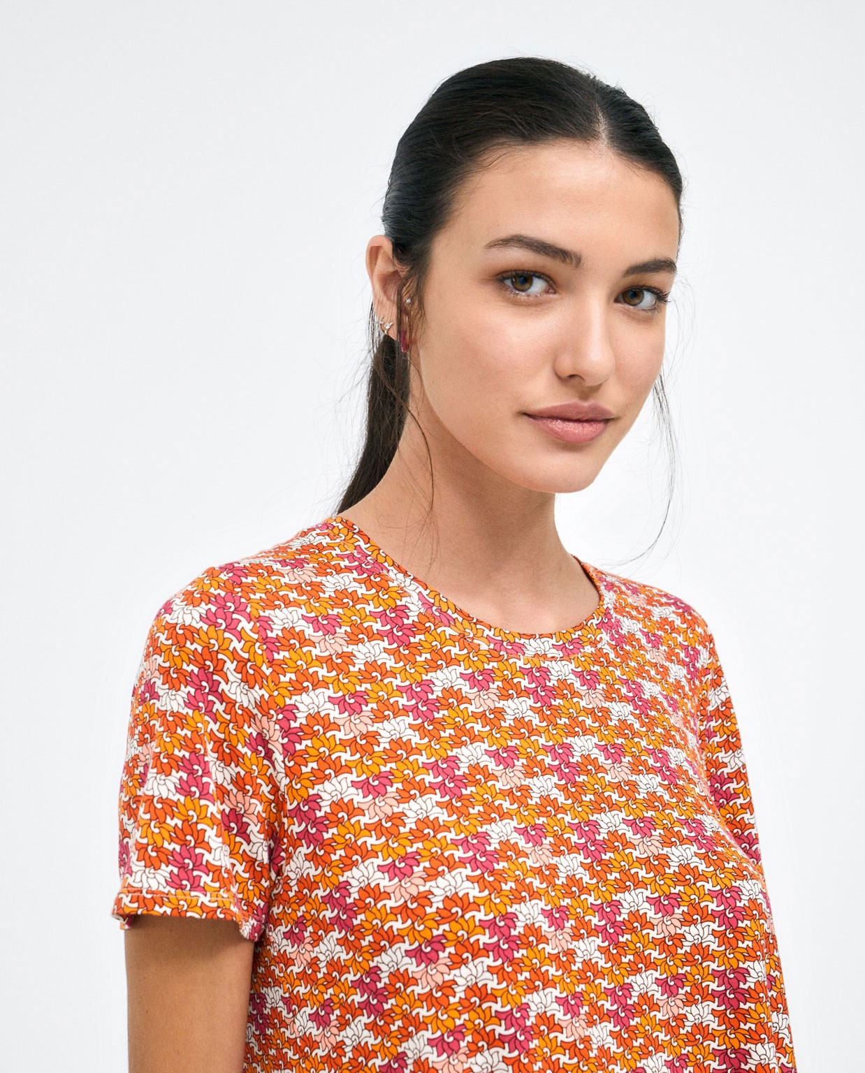 T-shirt à manches courtes. Elastique. Imprimé  Orange
