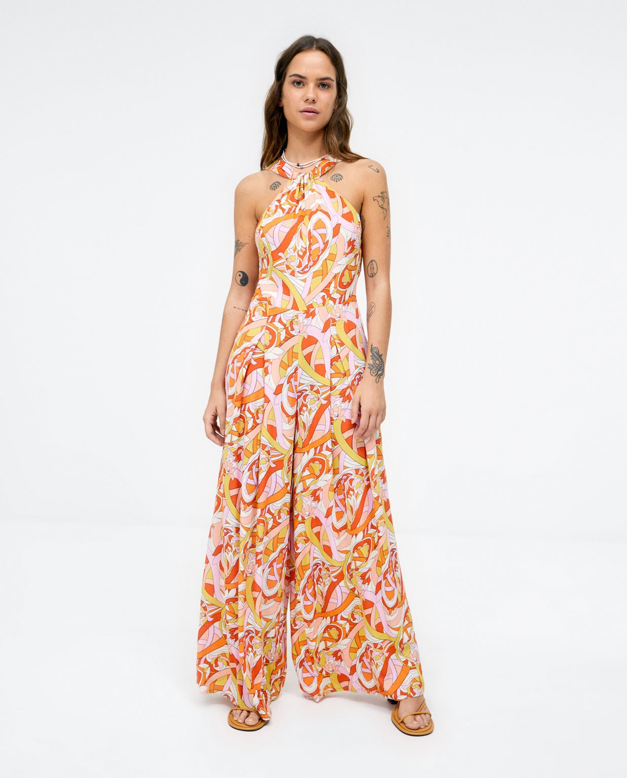 Combinaison à jambes larges. Collier de licou. Imp Orange