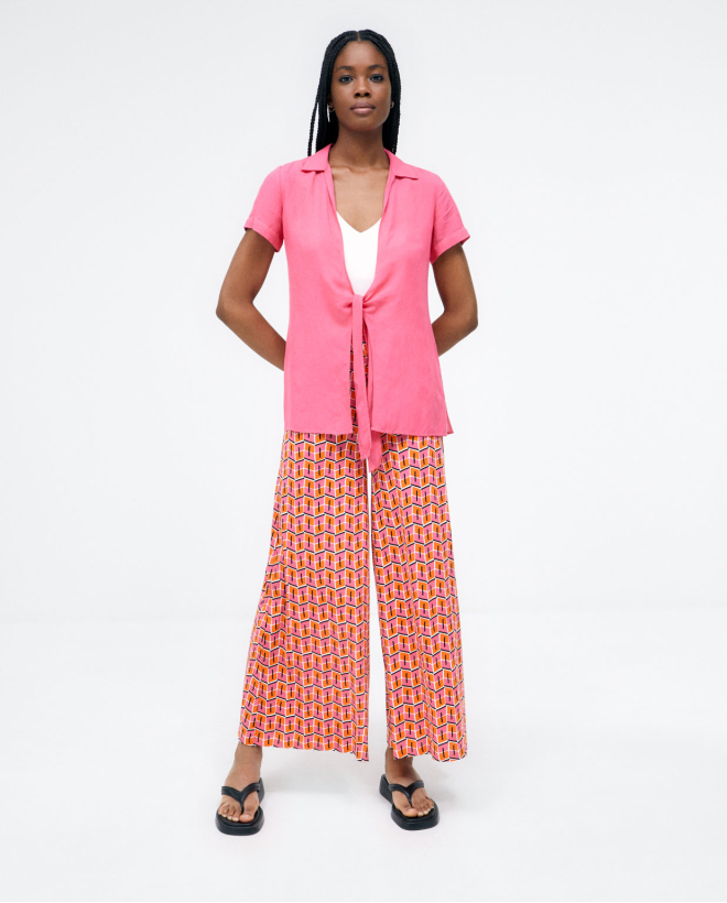 Blouse à manches courtes...