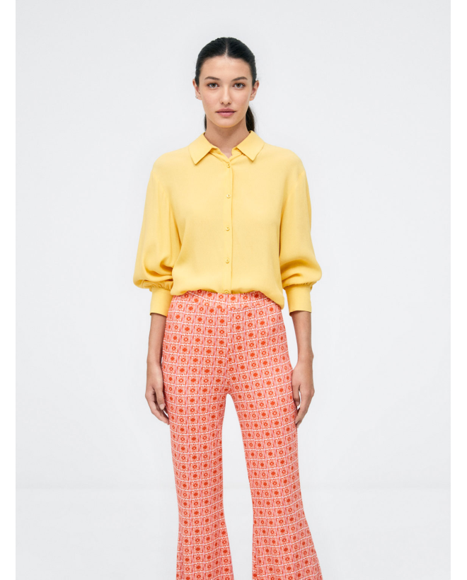 Long bell-bottom trousers....