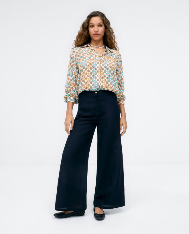 Pantalon long et large avec poches. Noir